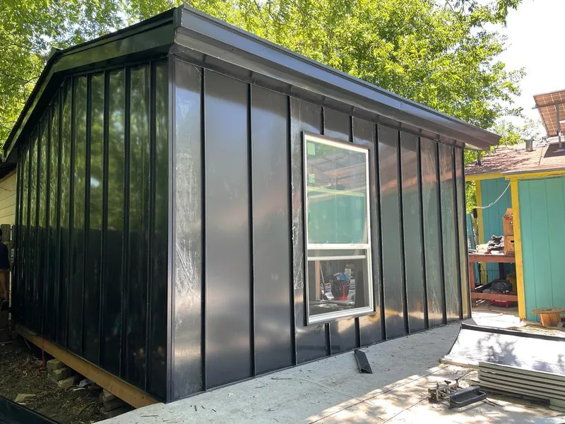 Black standing seam metal wall panels for Metal Roof Installation in Paris